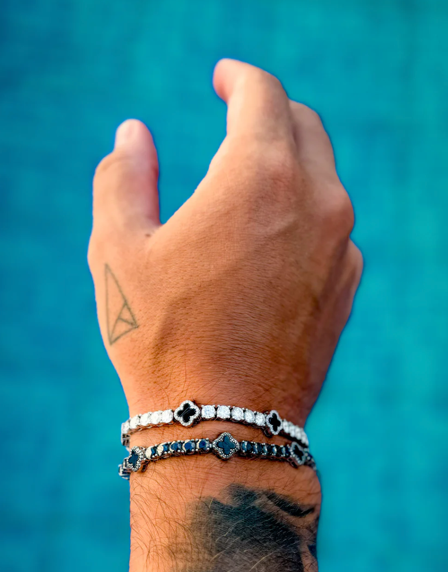 Discover Timeless Elegance: The Moissanite Black Clover Tennis Bracelet in White Gold